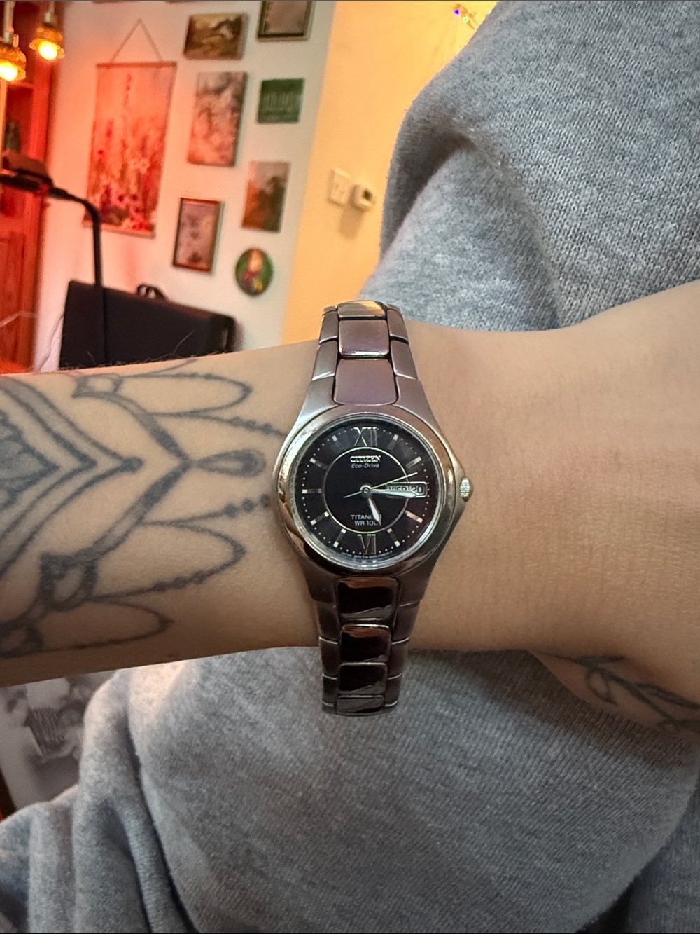 Citizen Titanium Eco-Drive Watch with Black Dial and Silver Bracelet/date/time